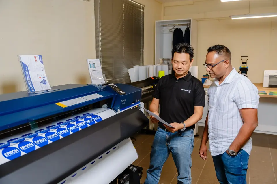 Demonstrating an Epson SureColor to a customer