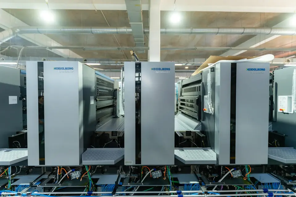 Heidelberg Speedmaster presses lined up in a workshop